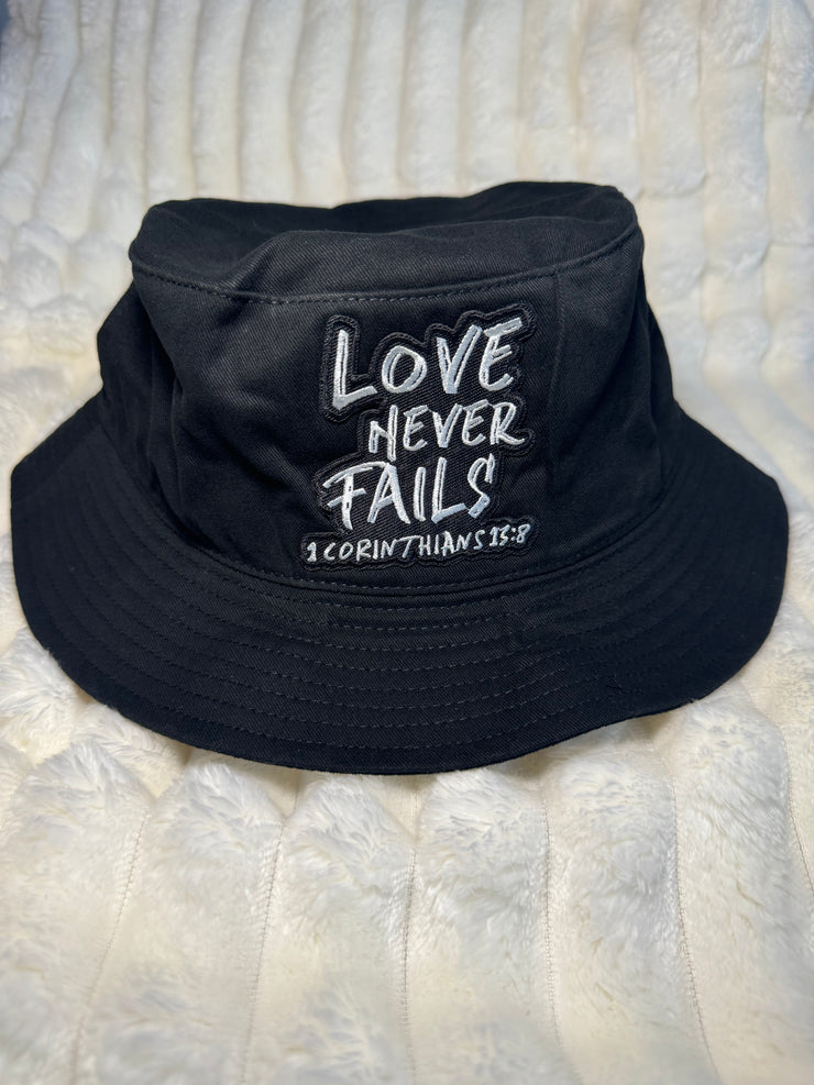 Love Never Fails Black Bucket Hat